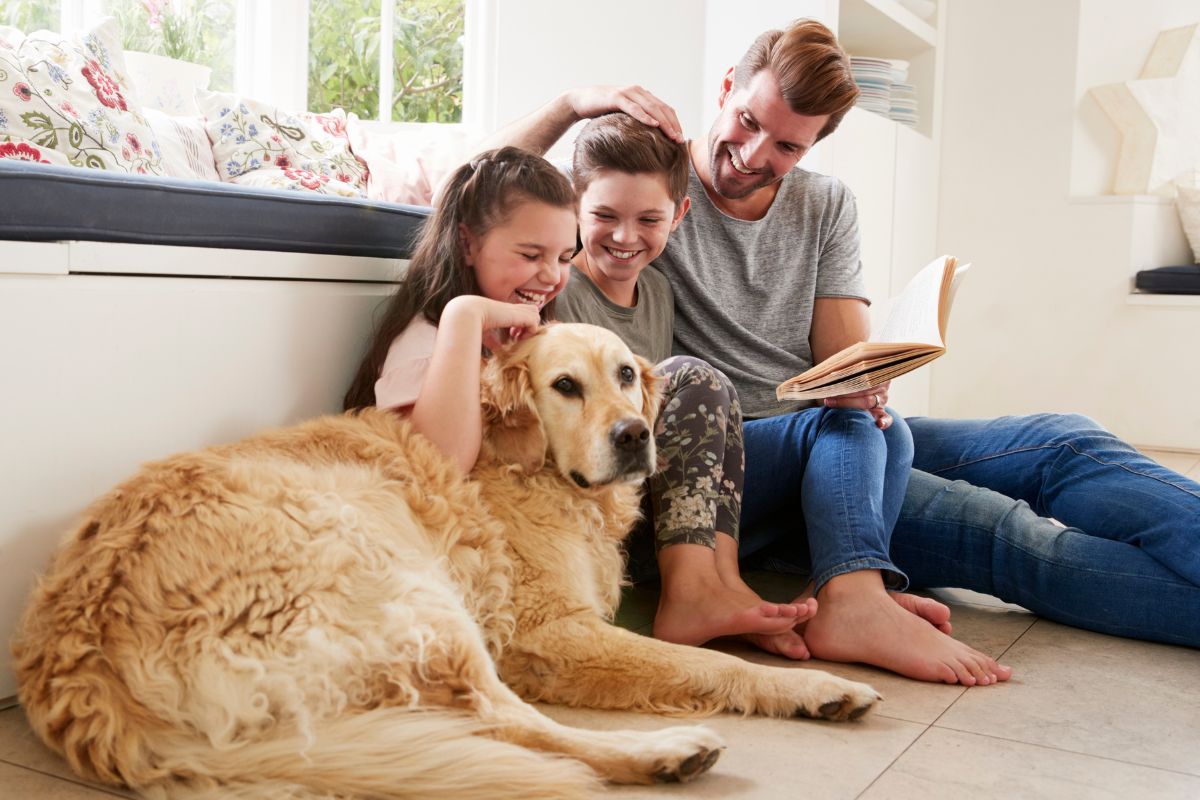 a family with their pet dog