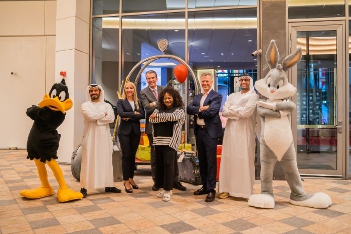 Mohamed Abdalla Al Zaabi (CEO of Miral), HE Mohamed Khalifa Al Mubarak (Chairman of Miral), Jochem-Jan Sleiffer (President, Hilton, MEA & Turkey) and Pam Lifford (President, WarnerMedia Global Brands and Experiences) at the grand opening of The WB™ Abu Dhabi