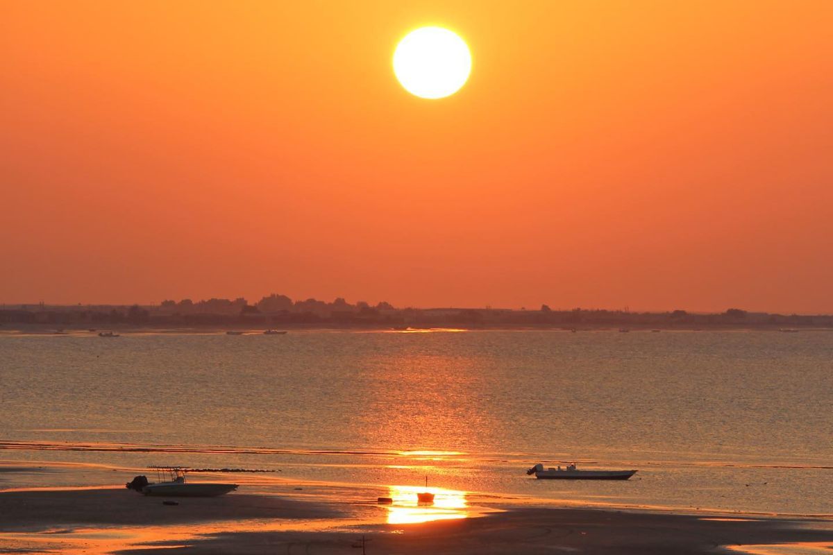 Sun setting at Ship Wreck beach in Abu Dhabi