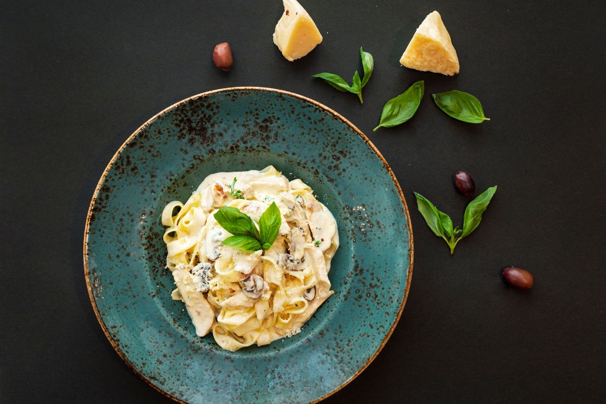 A plate of creamy pasta from Sheraton Corniche from the business lunch menu, for things to do in Abu Dhabi this July