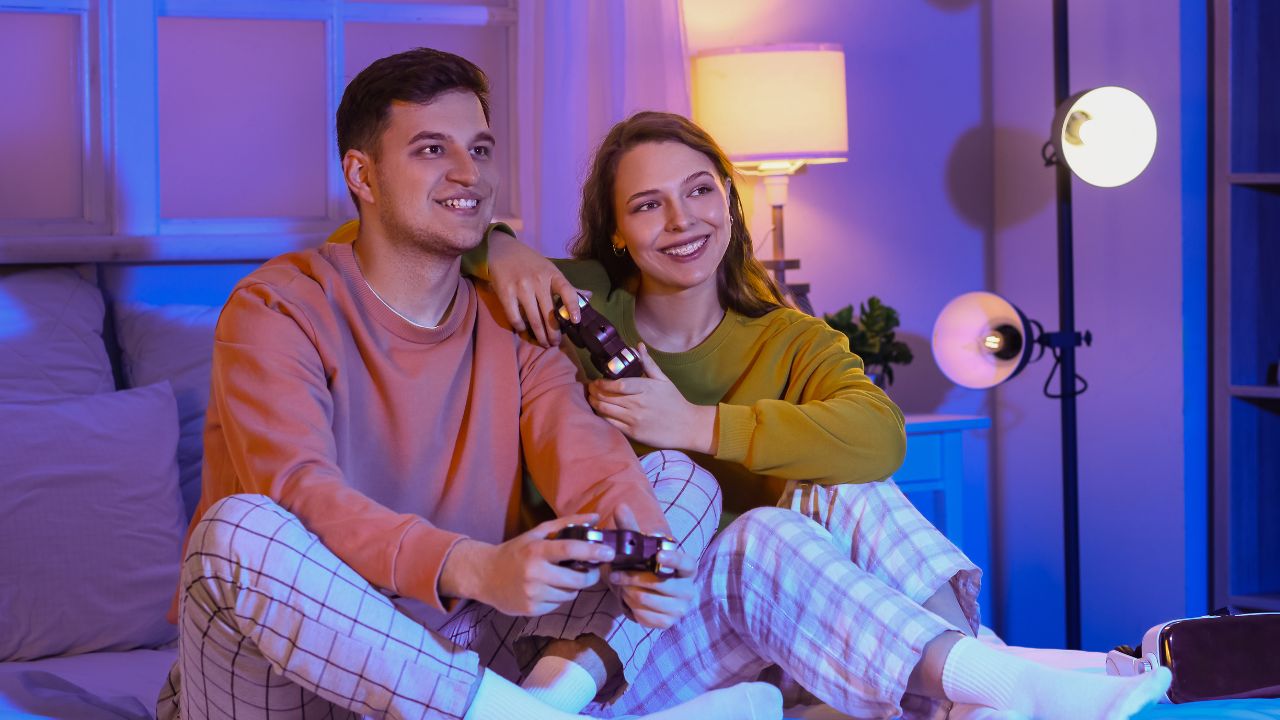 couple celebrating valentines day together at home to play games 