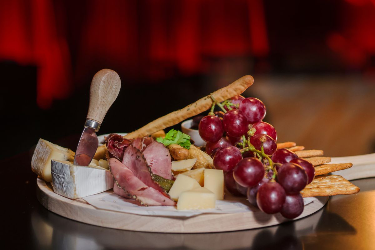 Cheese and grapes on the table at Jazz Bar