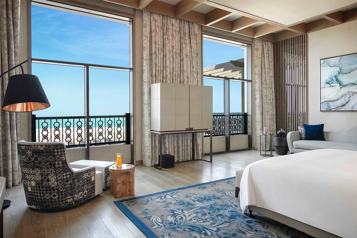 A bedroom suite beautifully funished for the staycay experience Saadiyat Rotana Resort Villas, one of the best things to do this Eid Al-Adha 2024