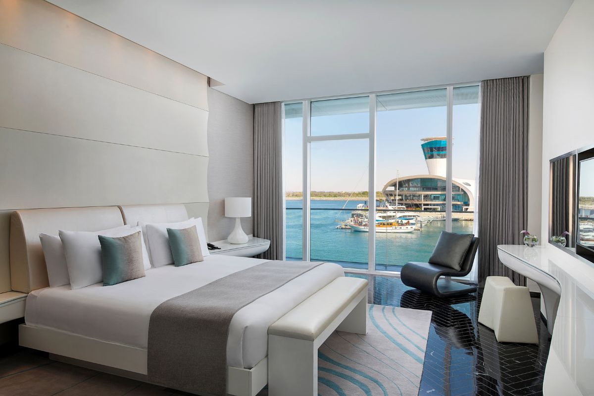 One of W Abu Dhabi Yas Island rooms overlooking the water with aesthetic interior design for staycation in the UAE