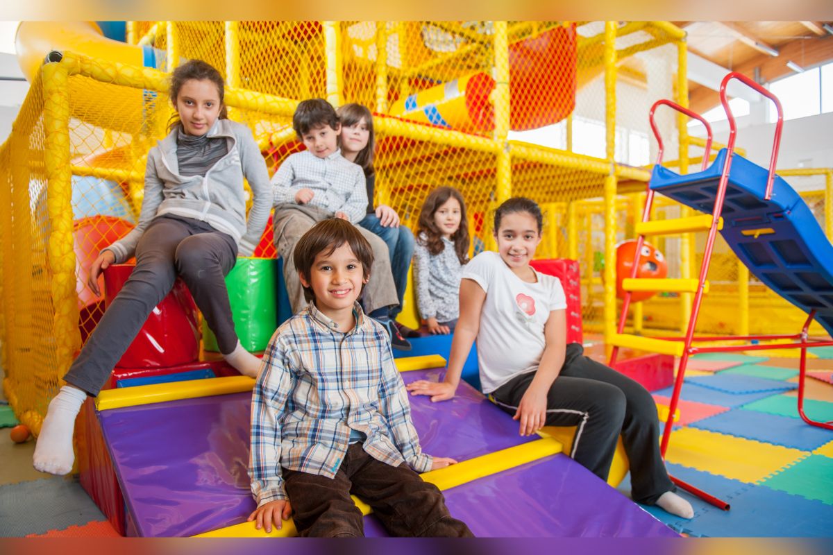 children on the playground indoors in Abu Dhabi Sports Council summer camps