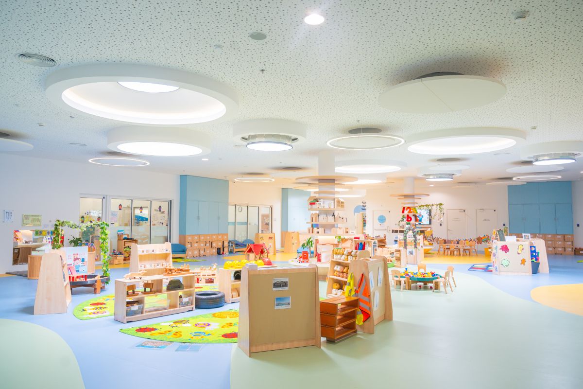 Pre-Prep room with playground inside and cabinets at Cranleigh Abu Dhabi Pre-Prep campus