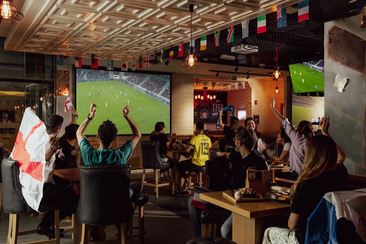 People watching football at Bridges Bar at Fairmont Bab Al Bahr Euro 2024 in Abu Dhabi