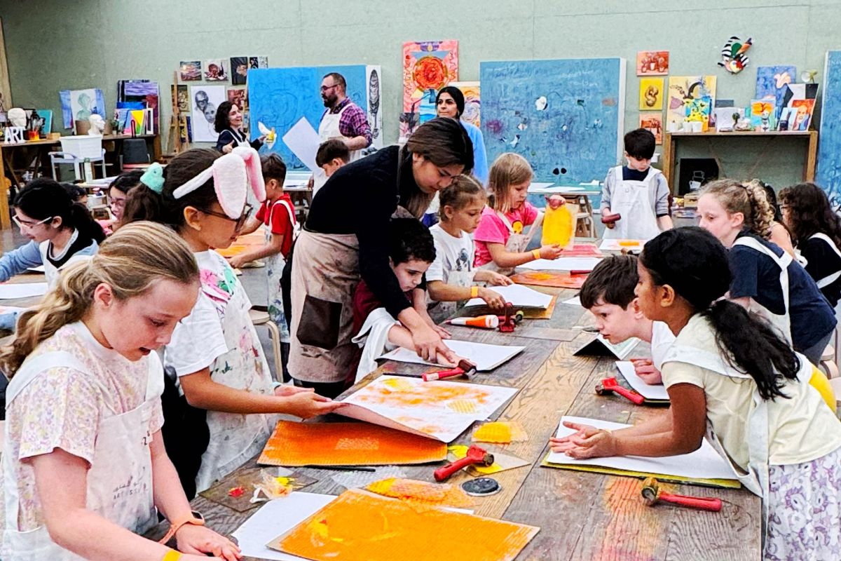 Students and teachers working on art projects for Summer Art Camp at Manarat Al Saadiyat and Berklee Abu Dhabi