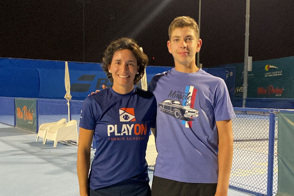 Tudor Zecheru, a rising tennis star in Abu Dhabi, with one of the members of his training team