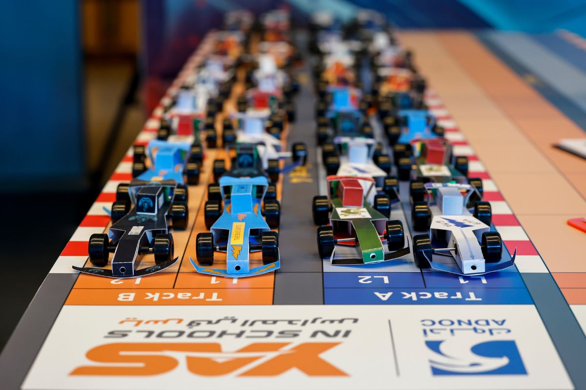 A line-up of paper cars for Yas Marina Circuit School competition