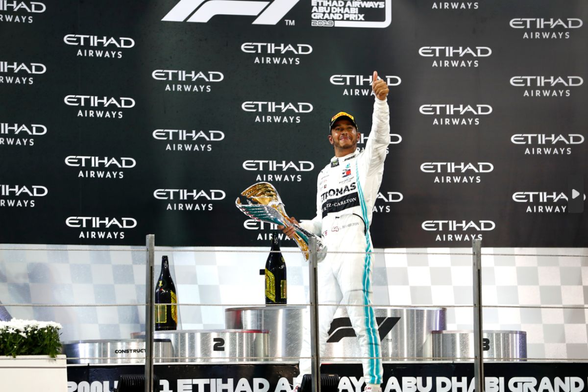 Lewis Hamilton at Abu Dhabi Grand Prix stage featuring Etihad Airways