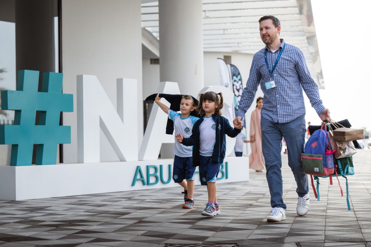 A parent guide kids to NAS Abu Dhabi