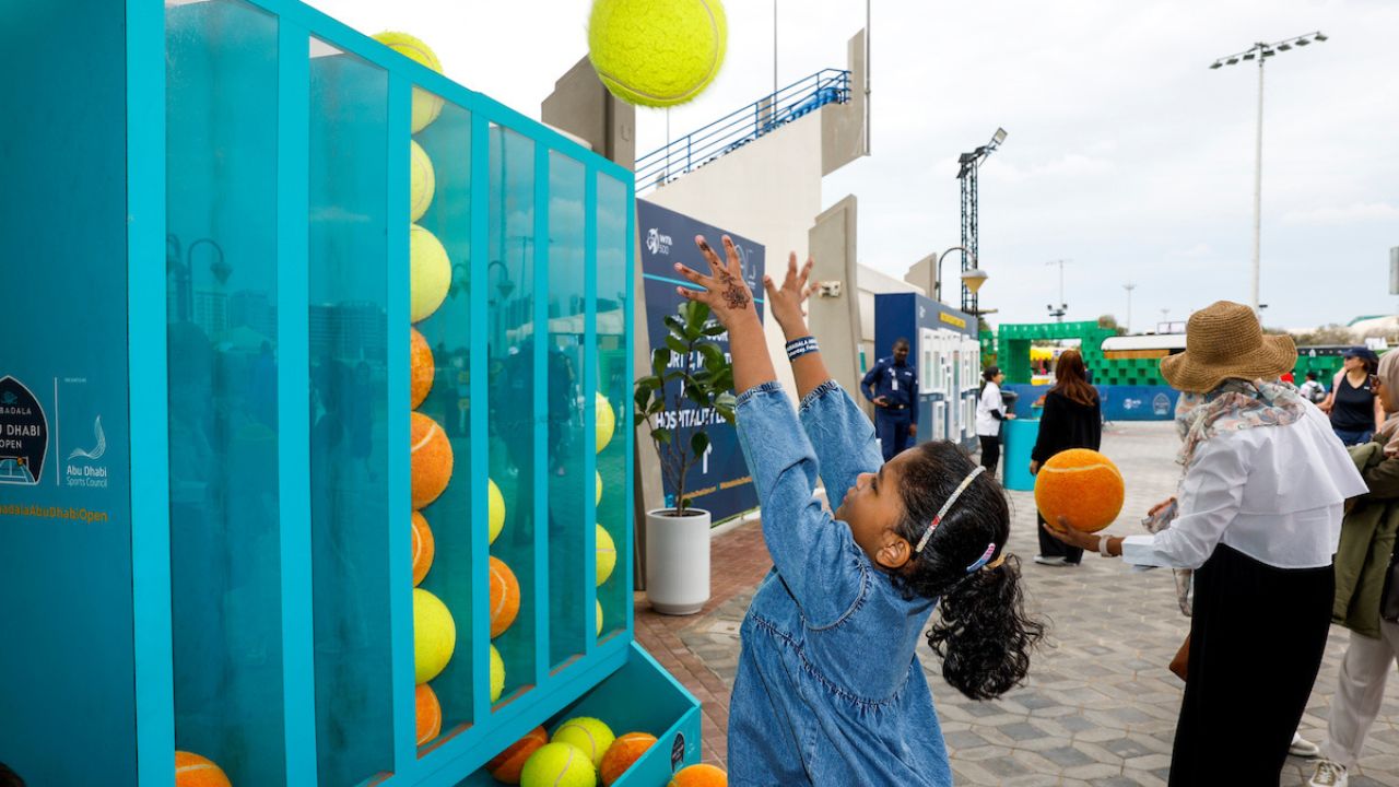 Child enjoying activation in the Tennis Village at Mubadala Abu Dhabi Open