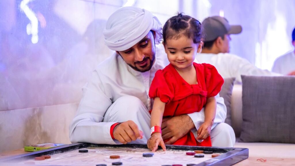 ramadan arcade kids playing checkers