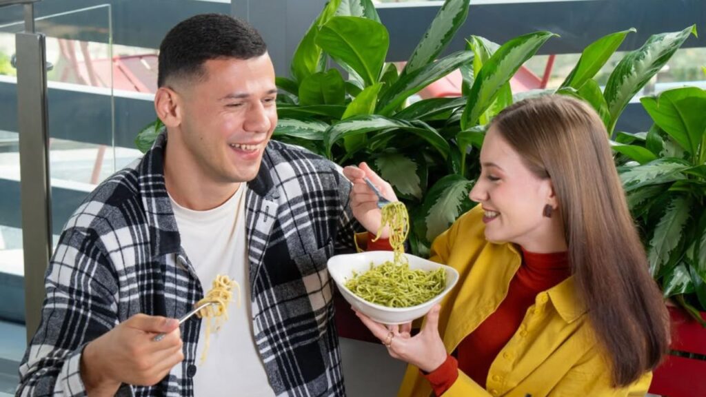 couple eating pasta at vapiano abu dhabi mall