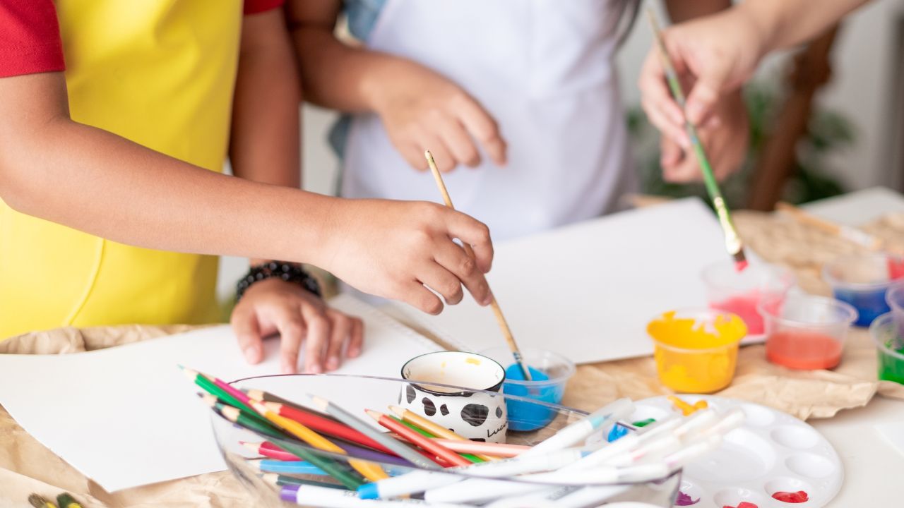 kids painting with paint