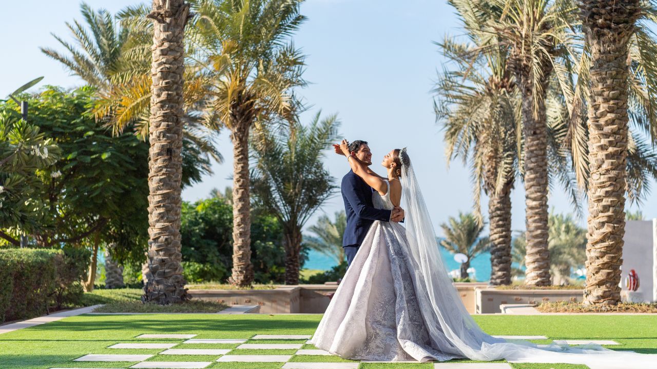 The St. Regis Saadiyat Island Resort wedding couple happy