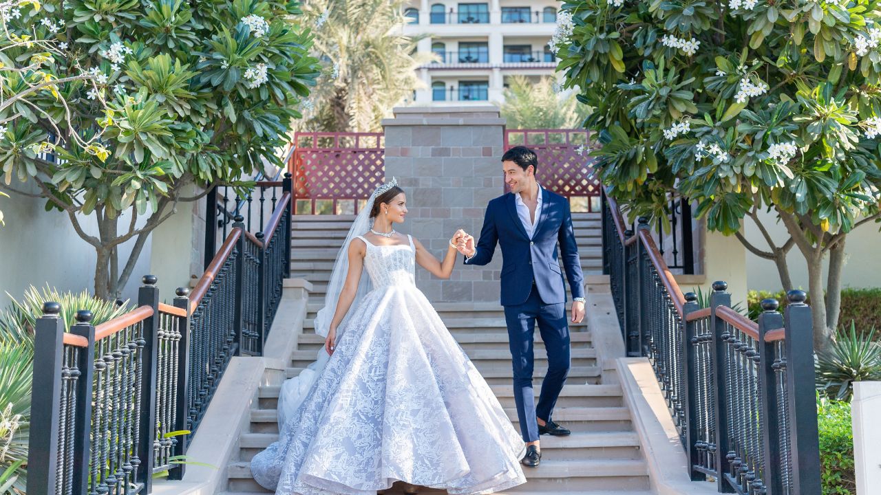 st regis saadiyat weddings (5) The St. Regis Saadiyat Island Resort wedding couple walking down the stairs