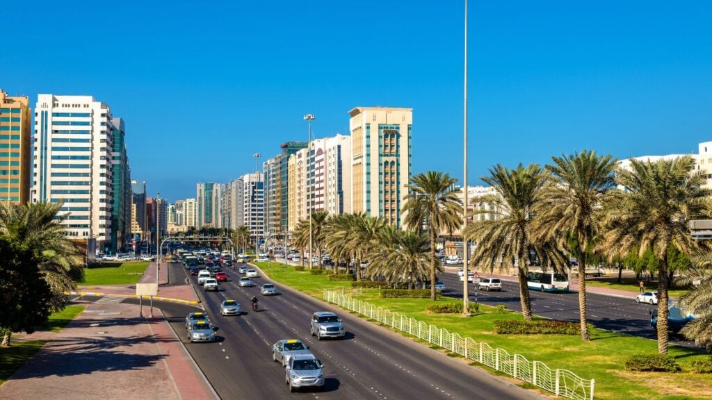 abu dhabi road with cars morning time
