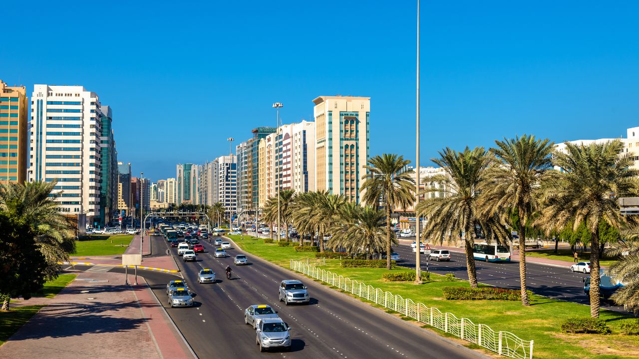 abu dhabi road with cars morning time