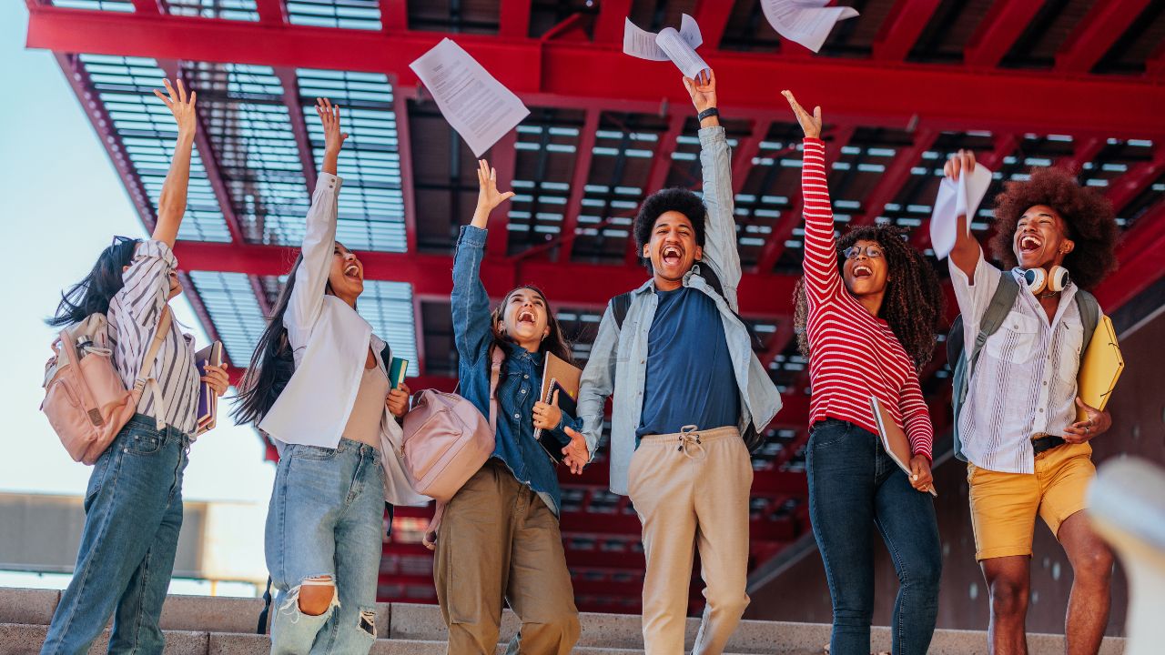 students happy to see their exam results