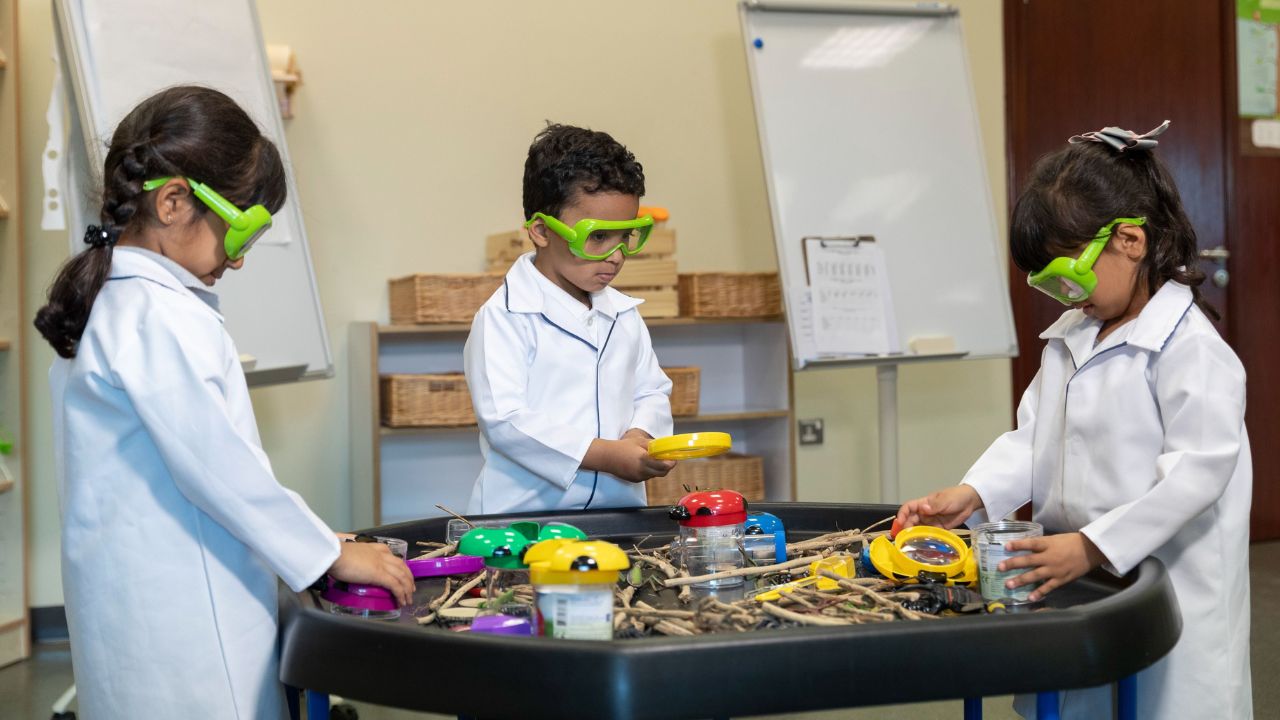 children at their nursery creating experiments