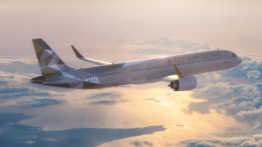 ETIHAD Airways flight over clouds to Europe.