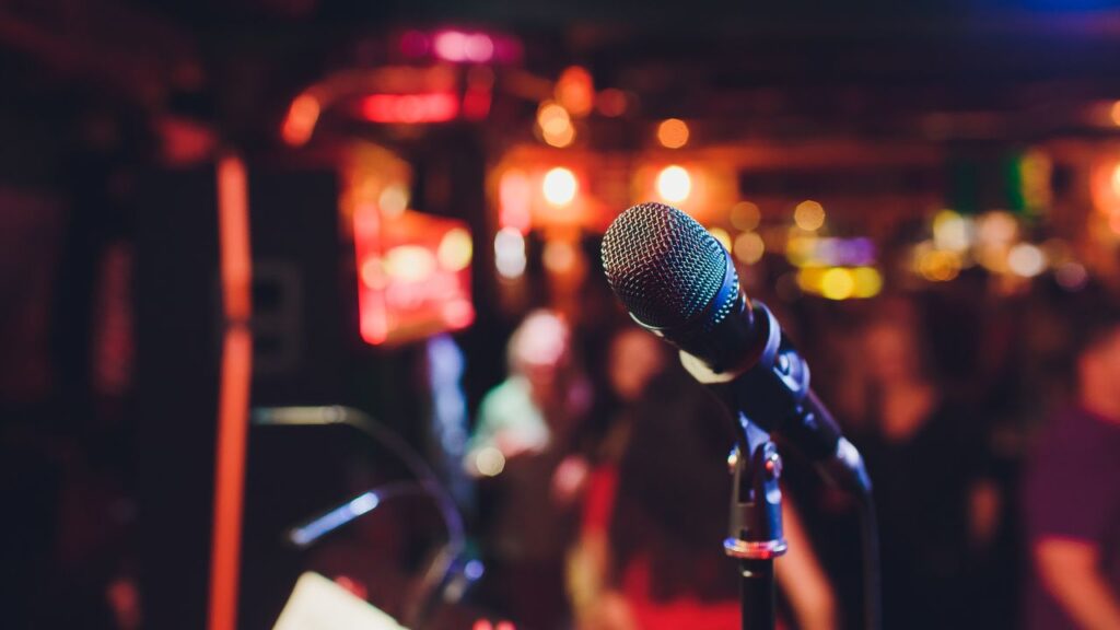 karaoke mic with red blurry background
