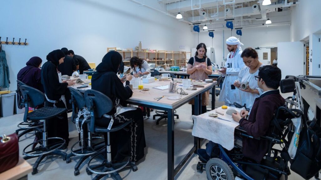 young adults doing artworks