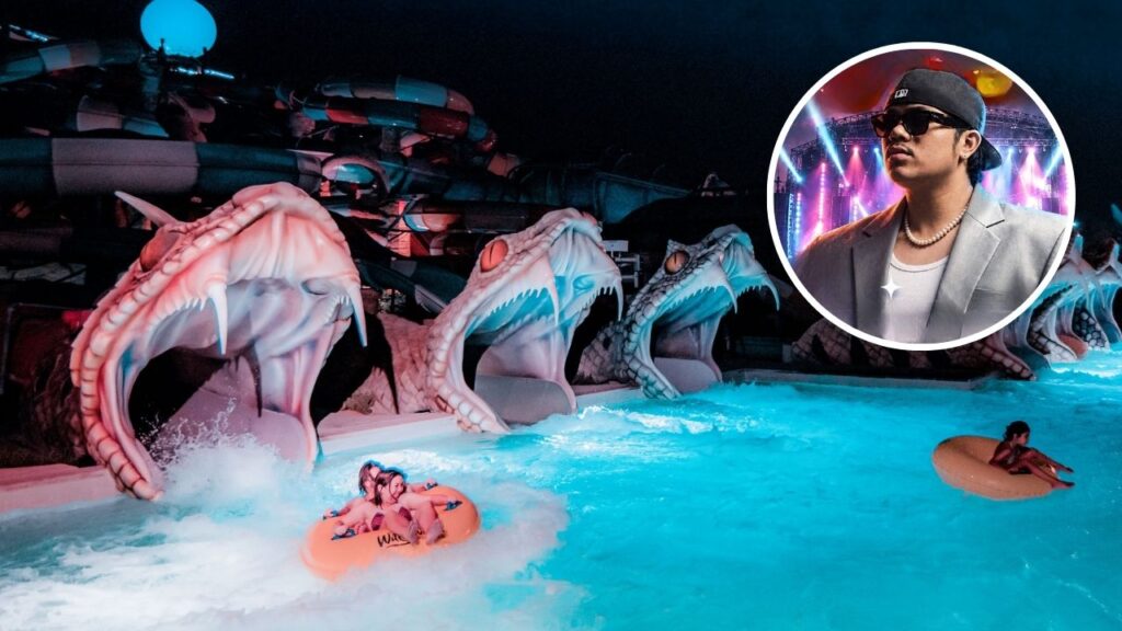 people on rides at yas waterworld night time