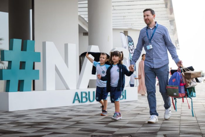 A parent guide kids to NAS Abu Dhabi