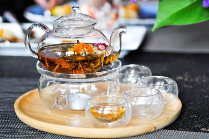 A teapot with flower tea for the tea-riffic event at Korean Cultural Center Bloom in a Cup Flower Tea event