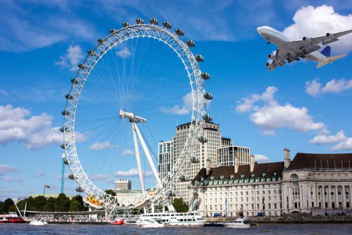 london eye with a plane