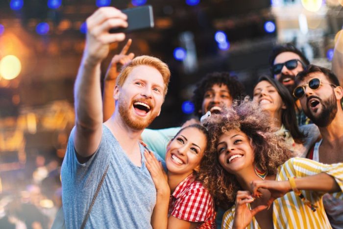 friends enjoying a concert