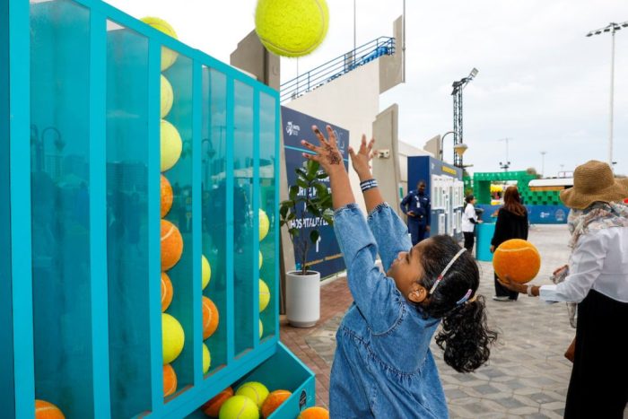 Child enjoying activation in the Tennis Village at Mubadala Abu Dhabi Open