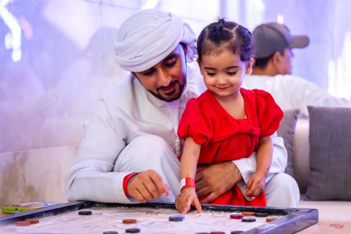 ramadan arcade kids playing checkers